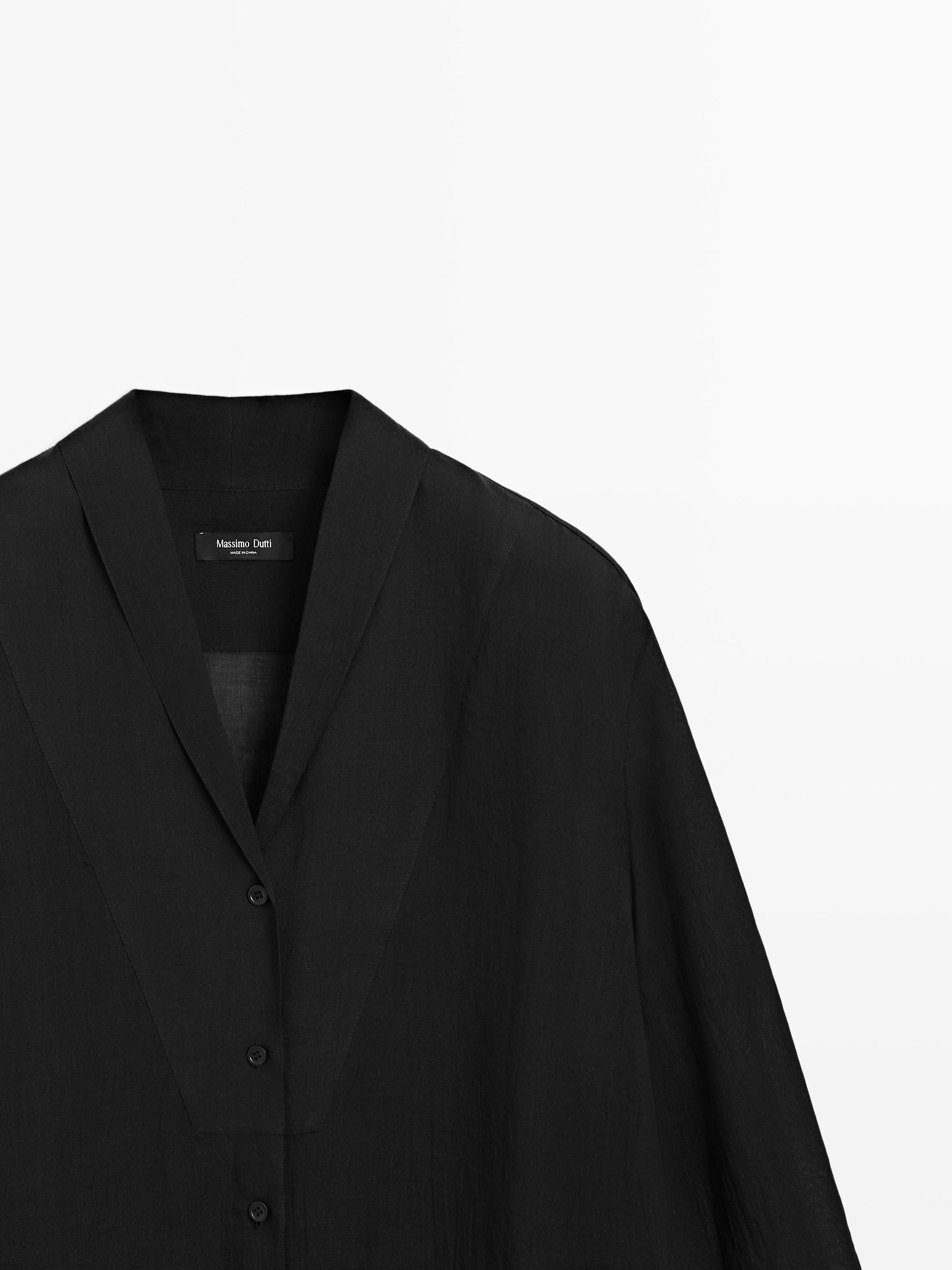 Flowing semi-sheer shirt with chest detail — BLACK