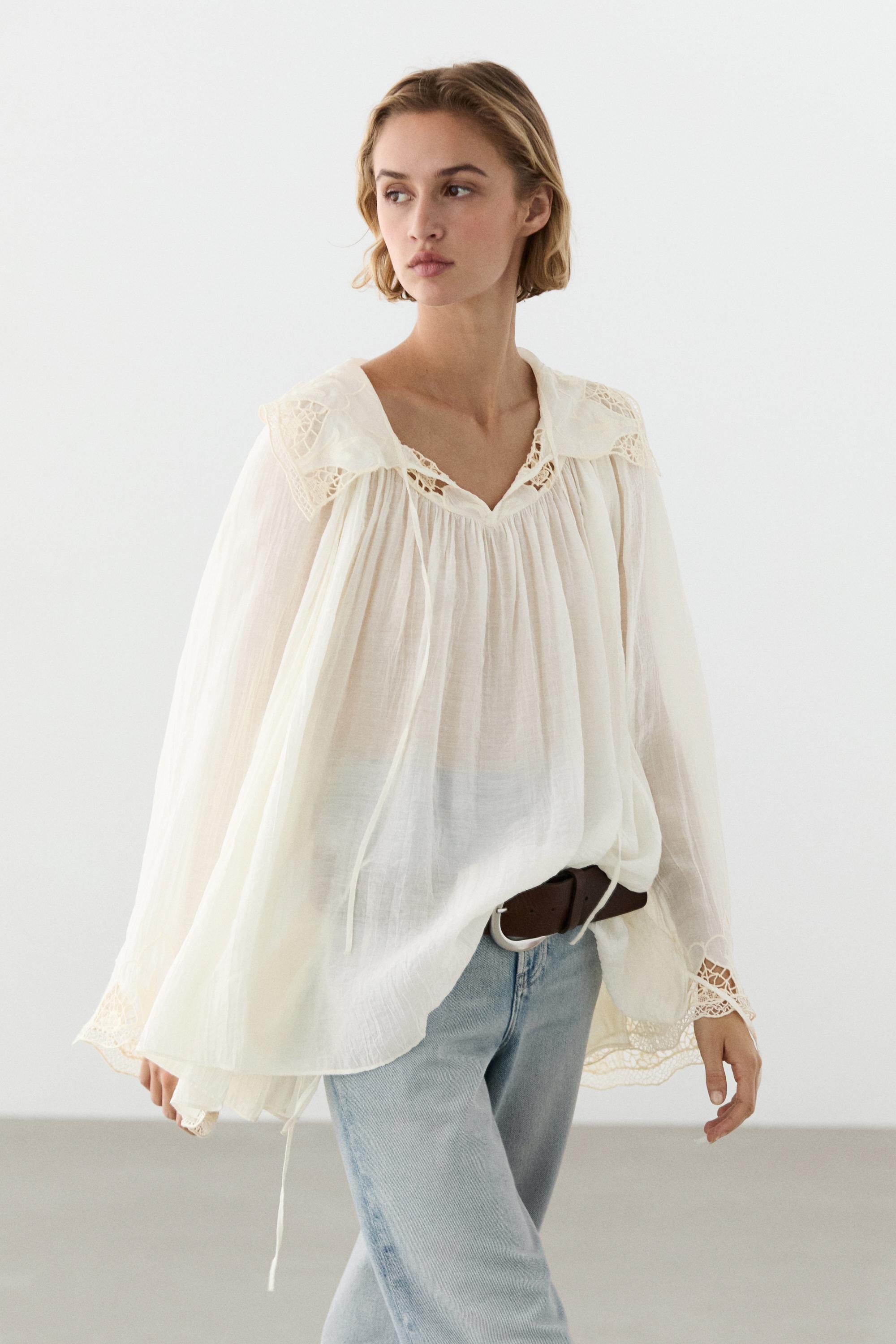 Blusa fluida detalle bordados