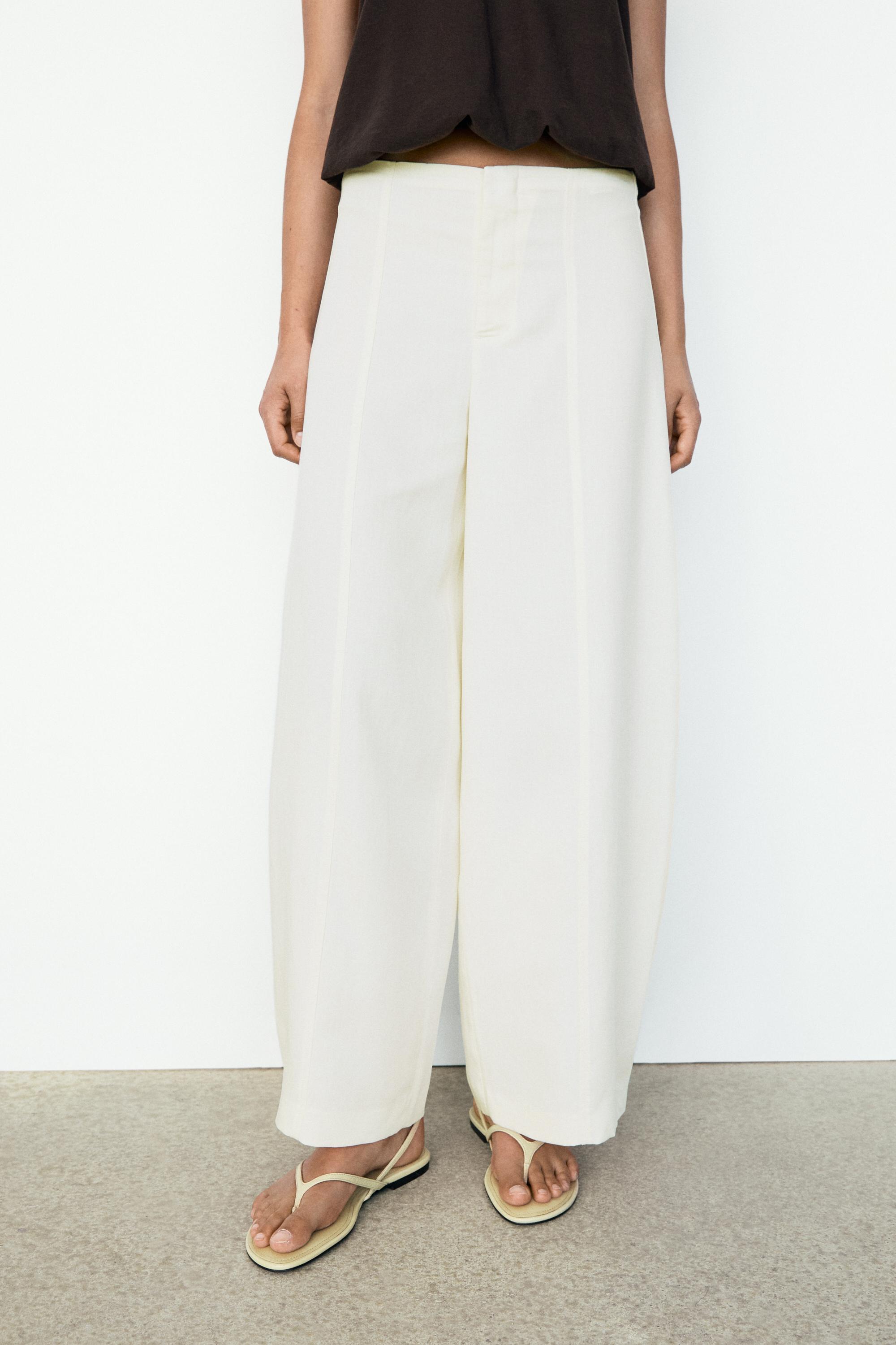 Flowing barrel fit trousers — OFF WHITE