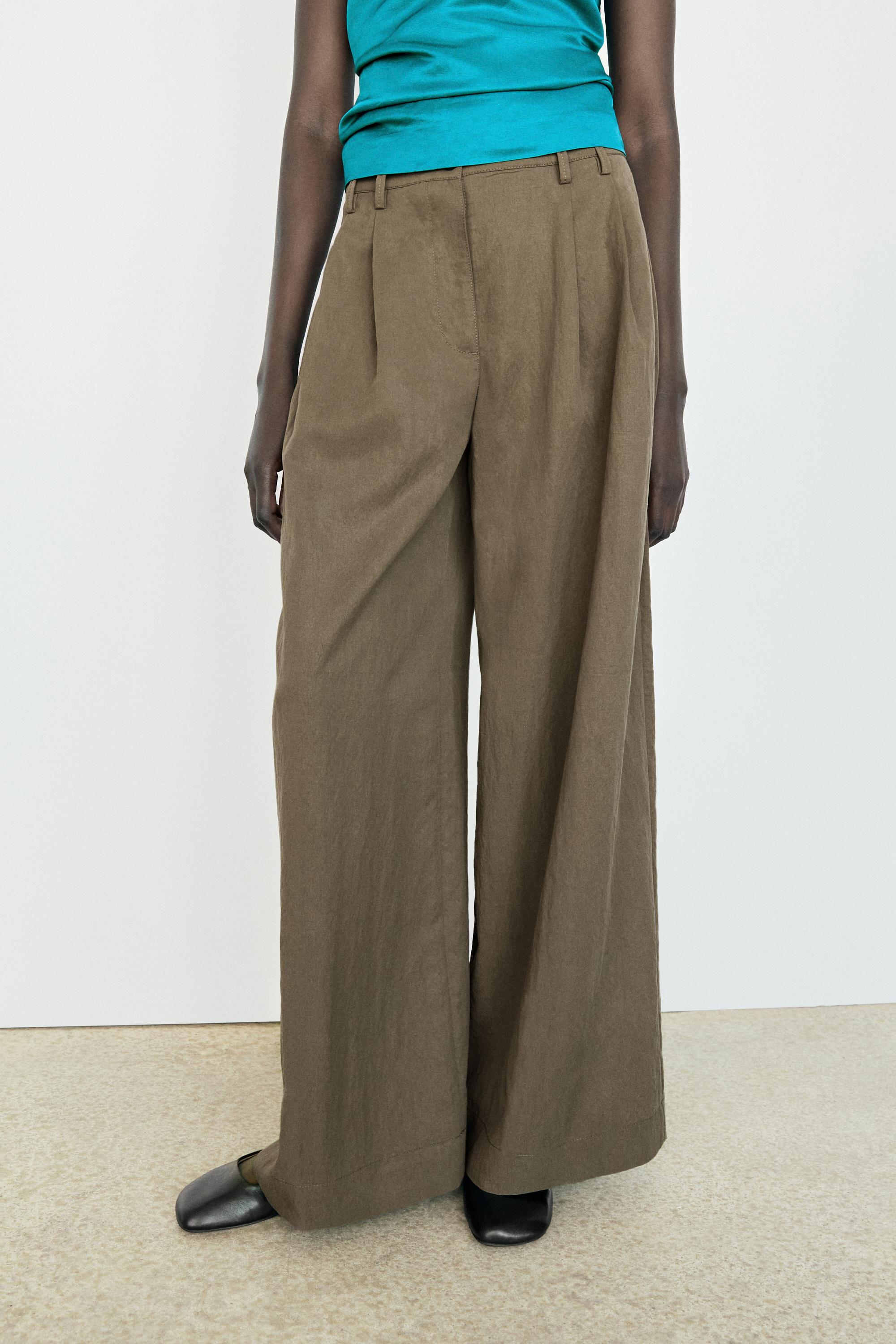 Technical wide-leg pleated pants