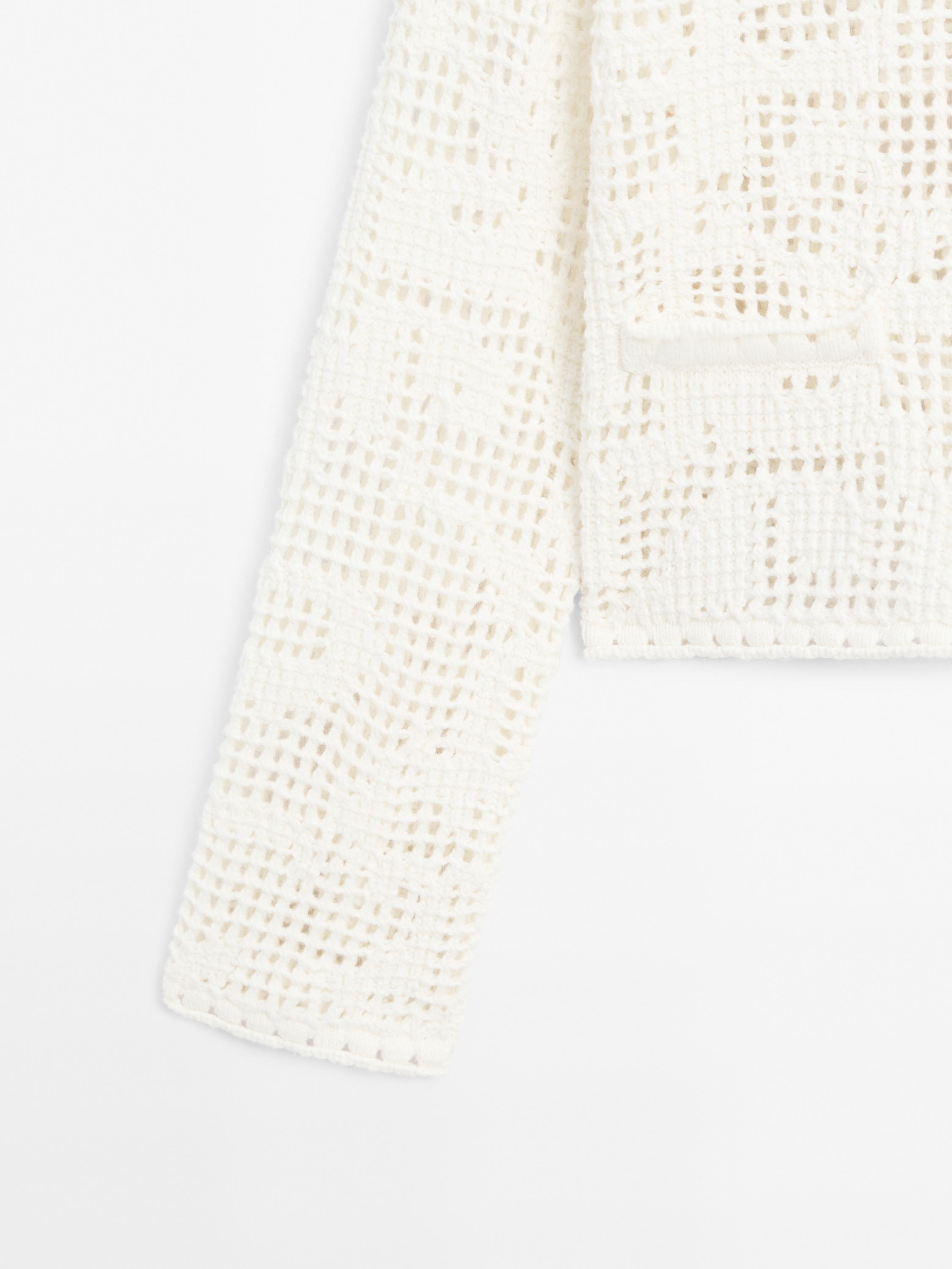 Crochet cardigan with rhinestone buttons
