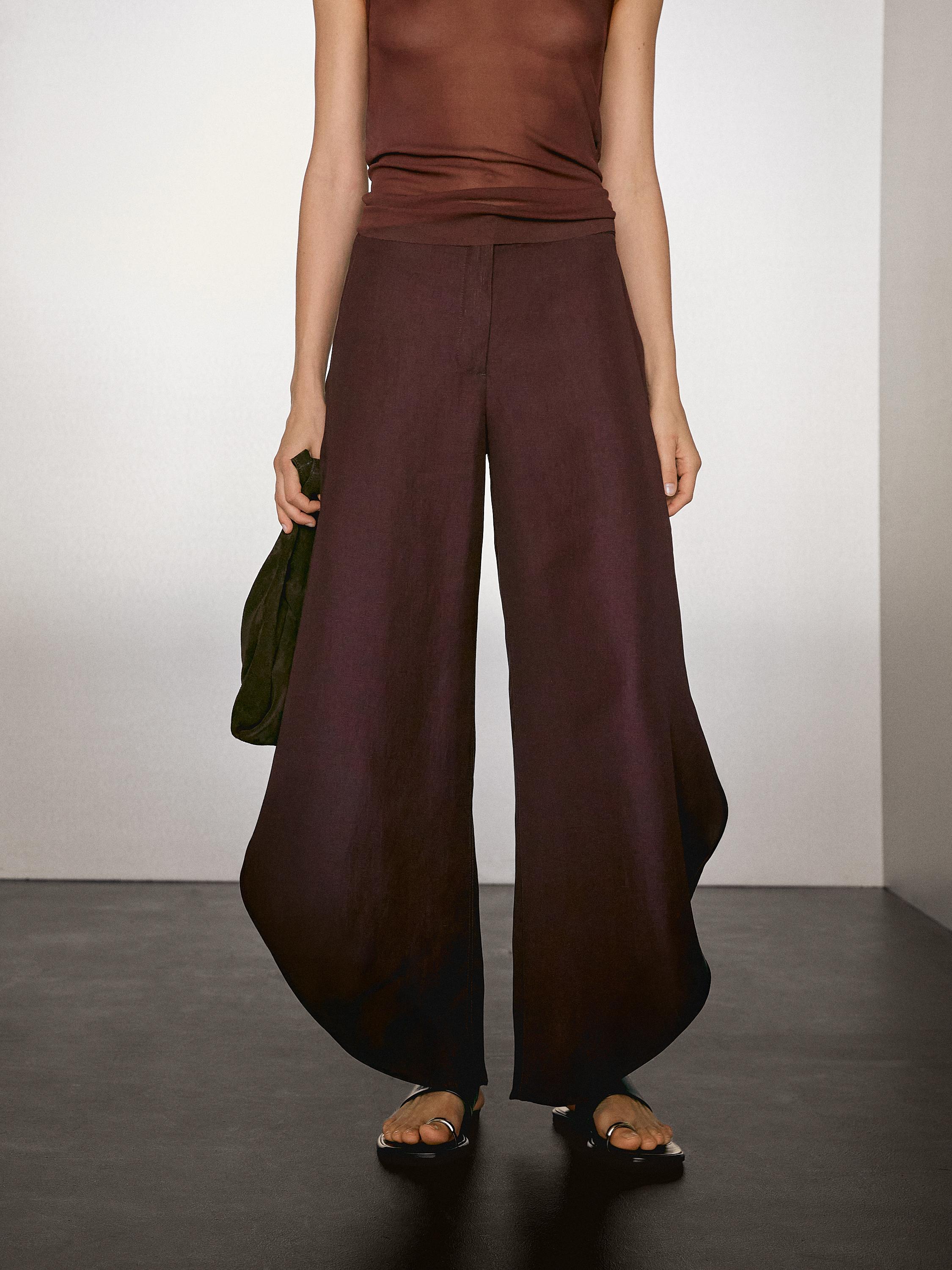 Flowing trousers with side vents
