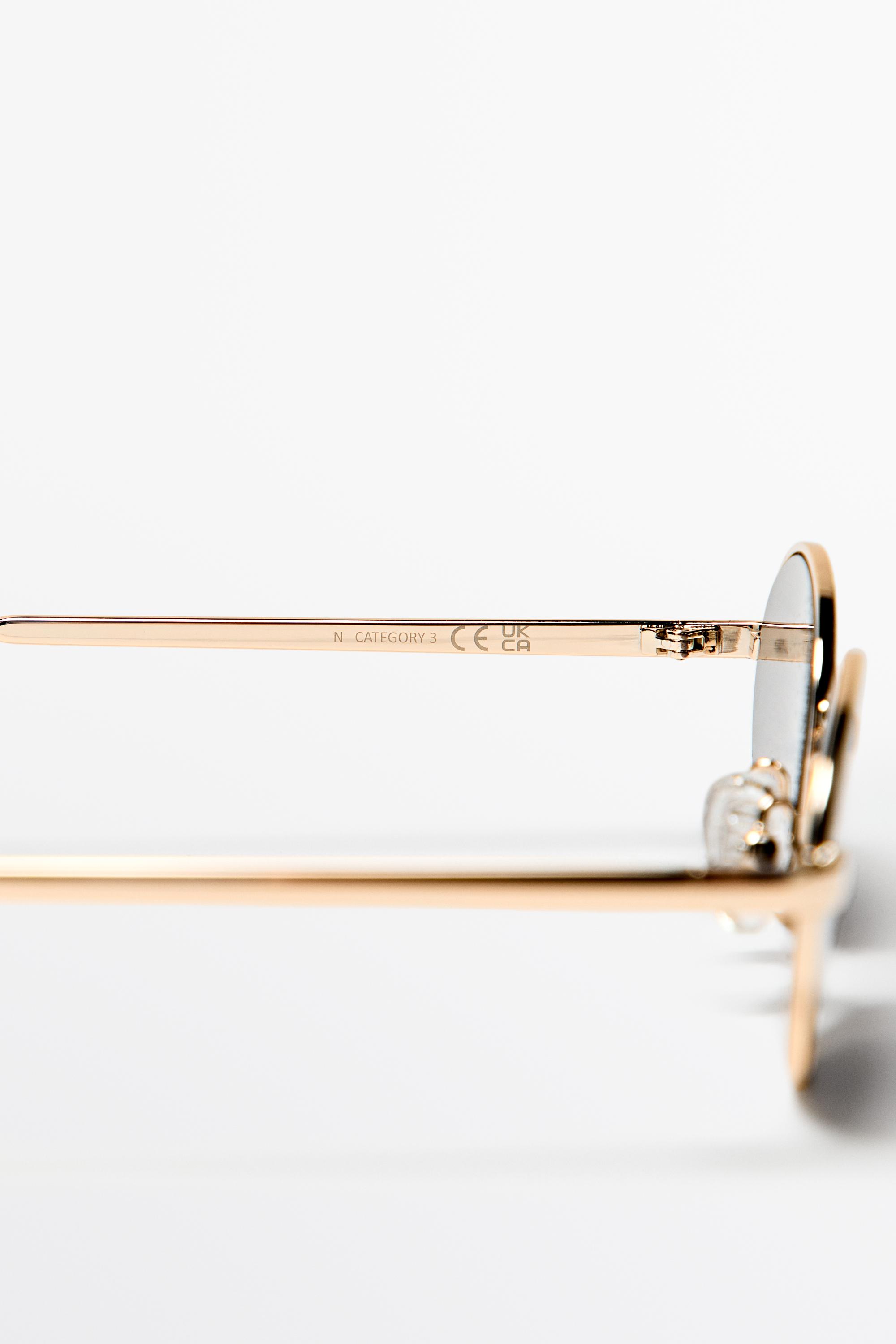 Metallic oval sunglasses — GREEN