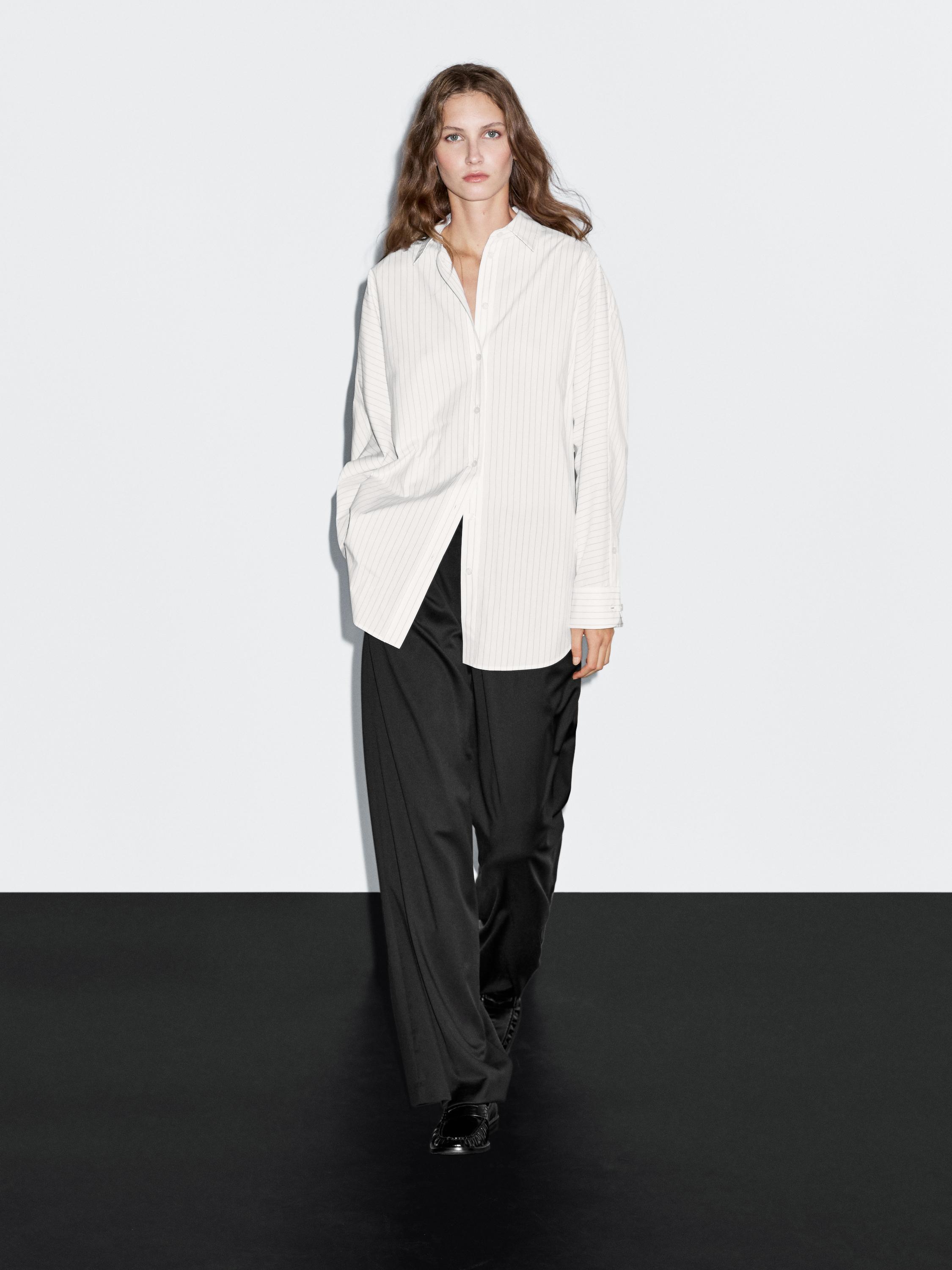 Chemisier à rayures et manches chauve-souris